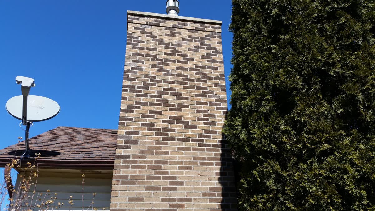 Full brick chimney rebuild in Rochester NY
